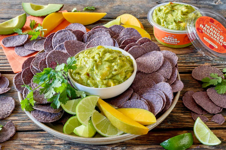 Dips, like Spicy Mango Habanero Guacamole, are some of the healthiest snacks at Trader Joe's