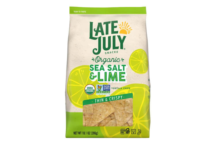 A packet of restaurant style tortilla chips made with real lime.