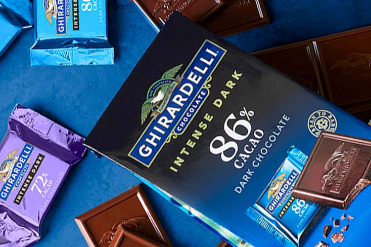 A bar of Ghirardelli 86% dark chocolate and individual squares