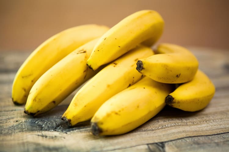 Bananas on a wooden surface