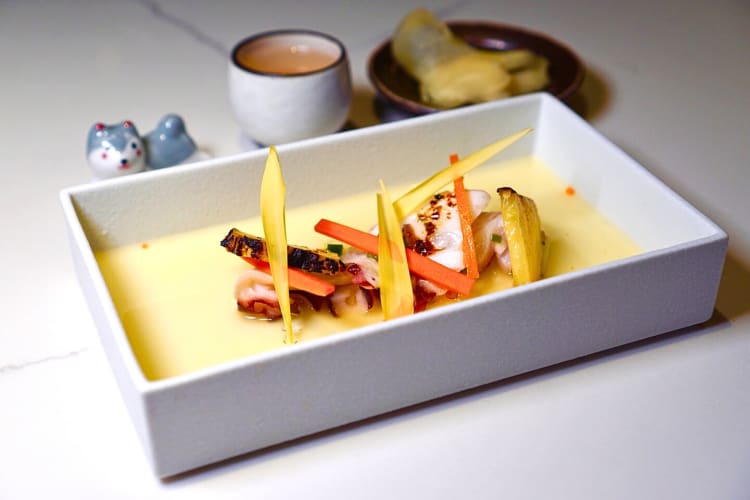 Sliced tentacles paired with citrus, pineapple, carrot and jalapeño from Hidden Omakase