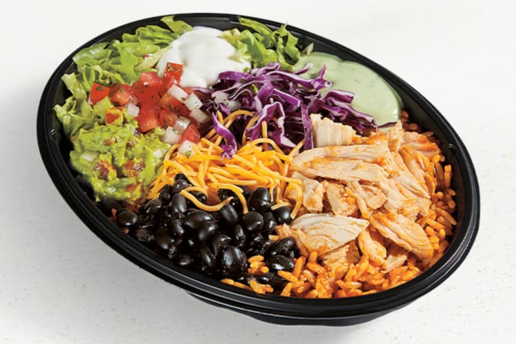 A Cantina Chicken Bowl with chicken, beans, rice and salad