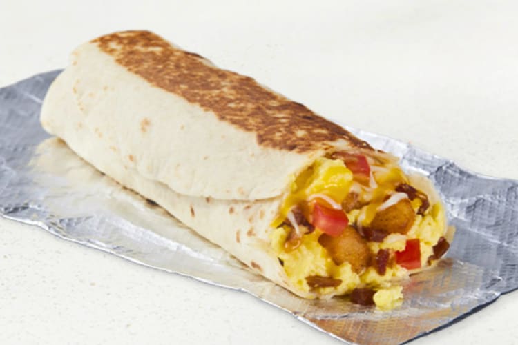 A Taco Bell Grande Toasted Breakfast Burrito With Bacon