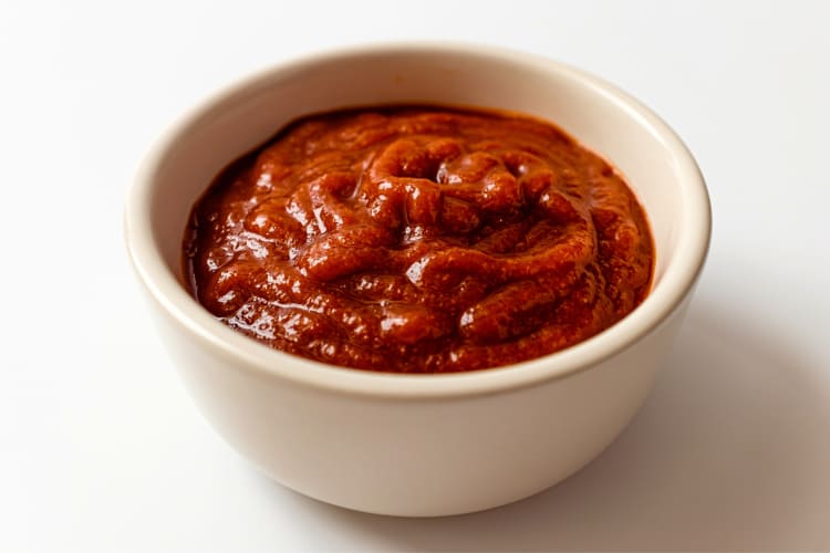 A bowl of Sriracha sauce