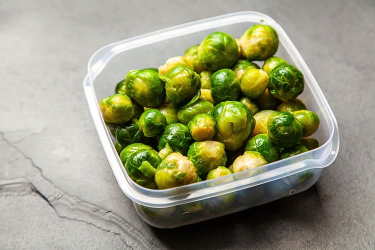 Brussels sprouts in a plastic container