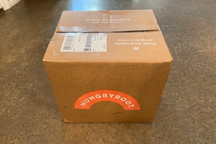 A cardboard box with an orange Hungryroot label