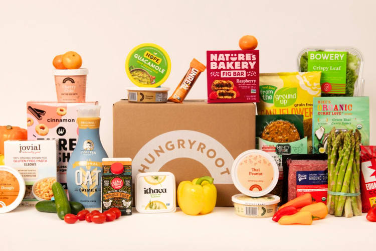 A box that says Hungryroot surrounded by groceries