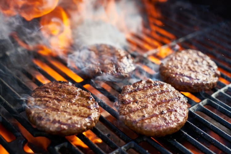 Burger patties on a grill