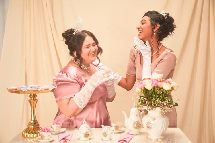 Two young ladies enjoying an afternoon tea together, as a teen birthday party idea
