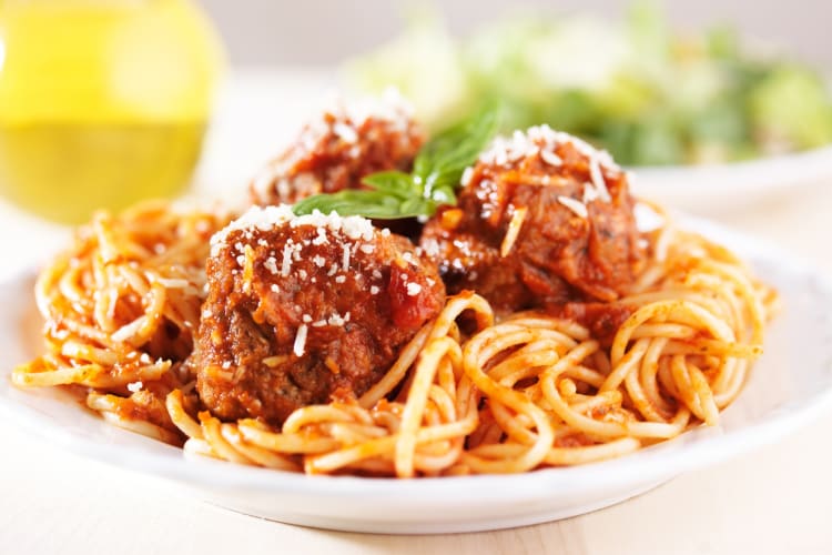 A plate of spaghetti and meatballs