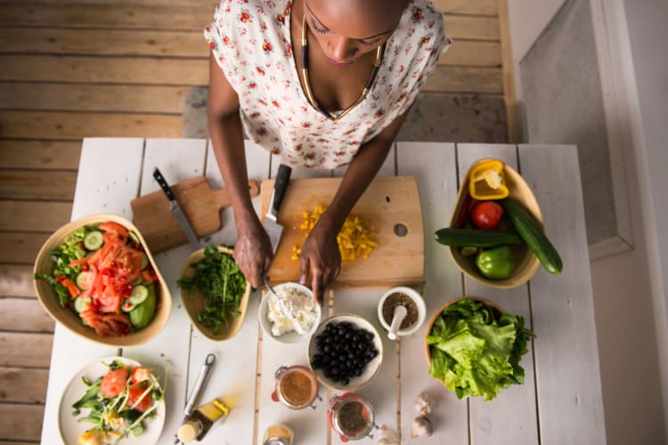 Woman cooking a salad.
