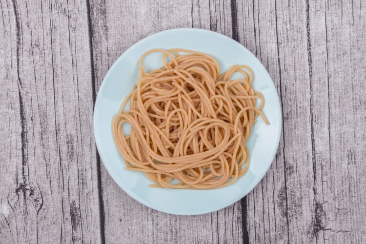 Wholewheat brown spaghetti on a plate. 