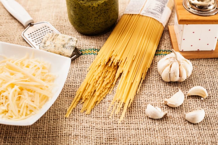 Dry spaghetti with cooking ingredients.