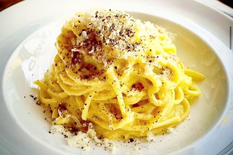 Classic spaghetti carbonara from an Italian restaurant in Toronto.