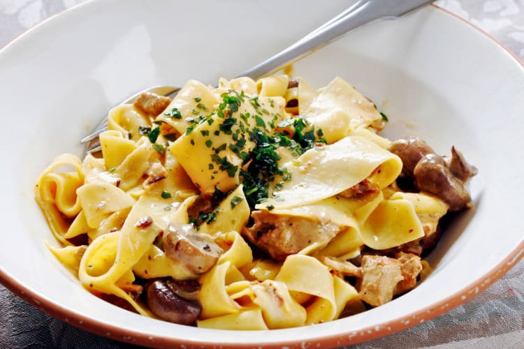 Pappardelle pasta featuring a braised and pulled brisket.