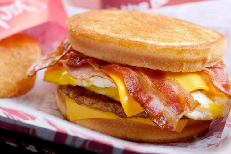 A breakfast sandwich with bacon