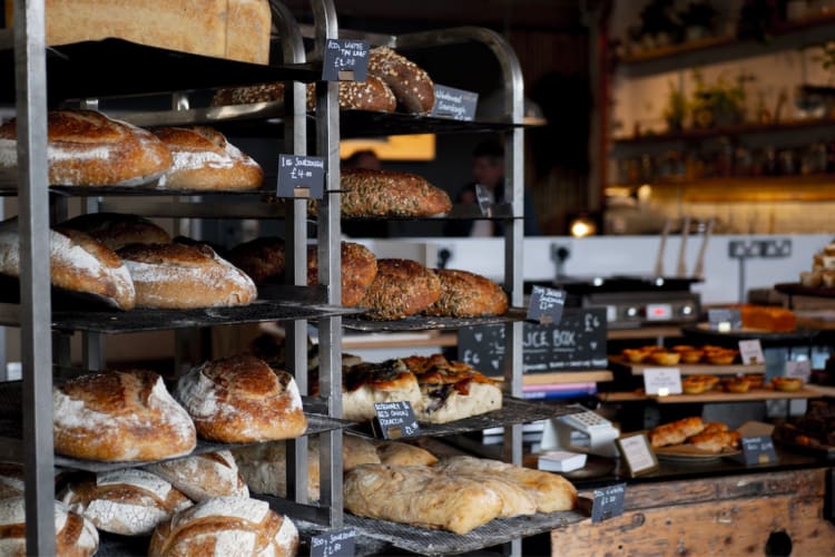 freshly baked loaves cooling in a bakery