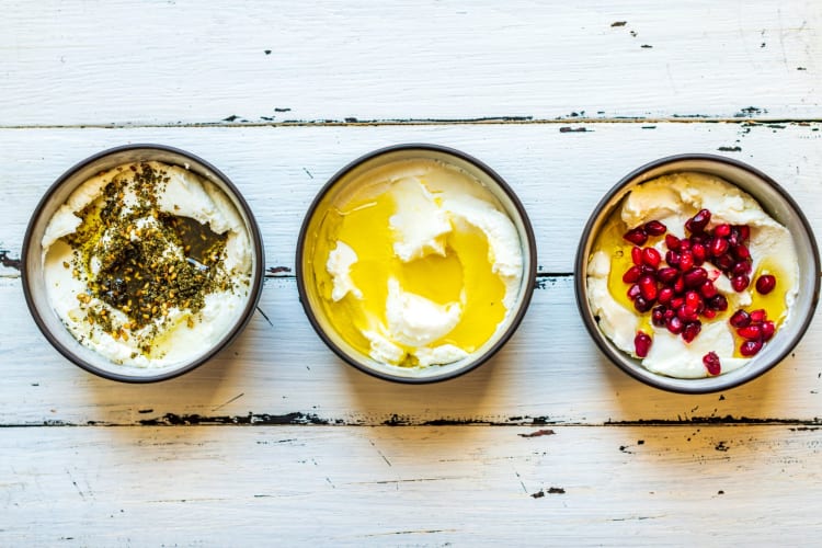 three bowls of dressed labneh