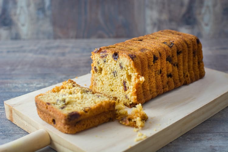 Baked loaf served on a wooden board