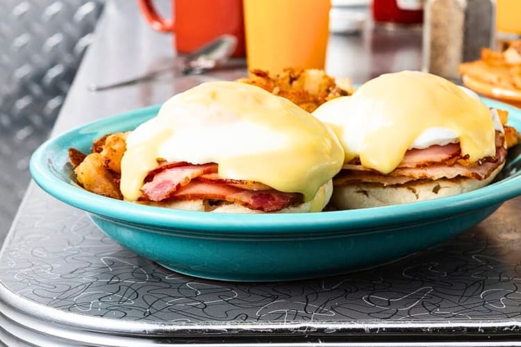 Two portions of eggs Benedict with bacon from Kelly O's Diner in Pittsburgh