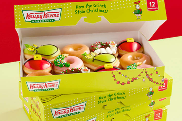 A green box with Grinch donuts