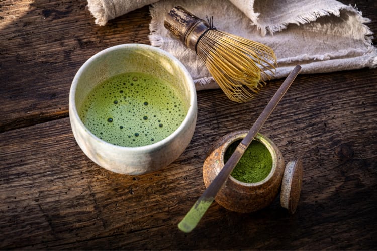 Matcha tea with a matcha whisk