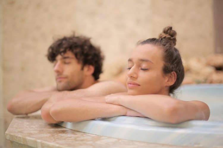 A couple in a pool at a spa