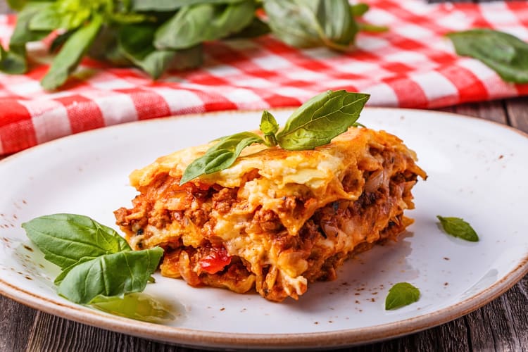 Portion of lasagna Bolognese on a plate