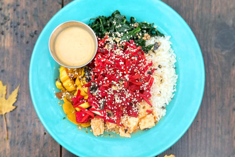 Aerial view of a bowl of various foods from Laughing Planet