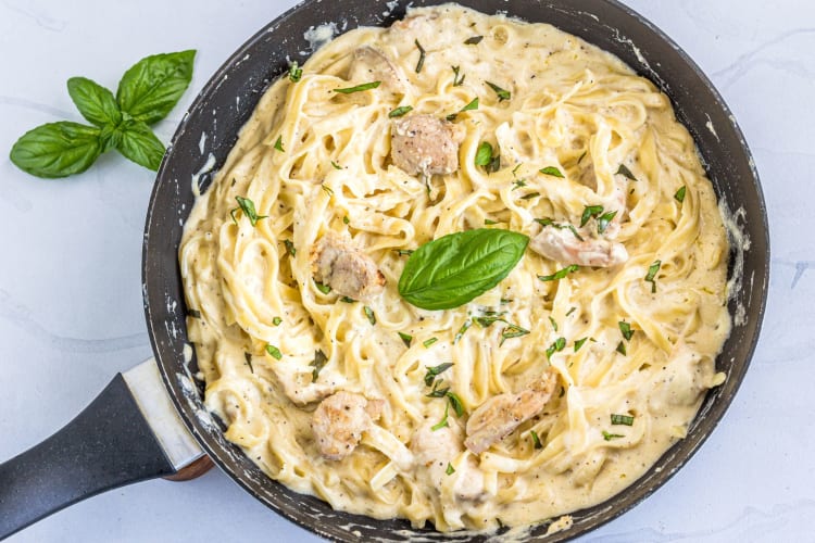 A pan of creamy chicken fettuccine.