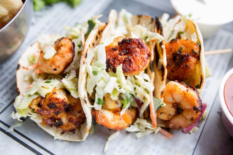 Shrimp tacos with slaw on a plate