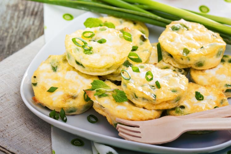 Mini frittatas with green onions on a plate