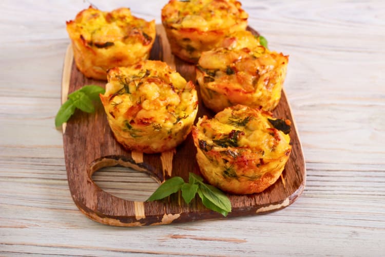 Freshly baked mini quiches.