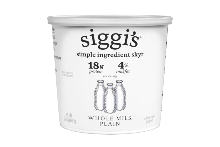 A black and white container of low-sugar yogurt