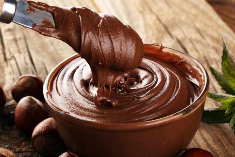 Try using chocolate spread as a cocoa powder substitute 