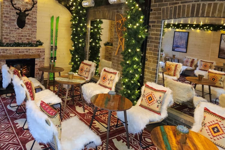 Get cozy with your date in London in this log cabin bar