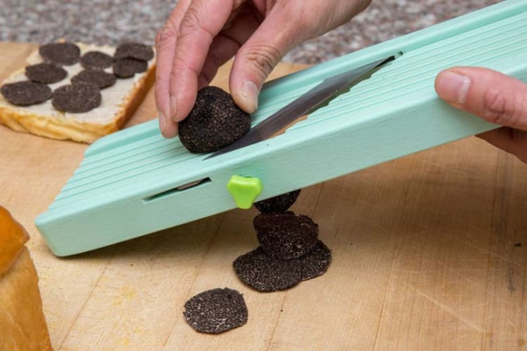 A chef preparing truffles