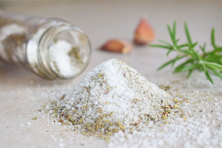 garlic salt spilling on table 