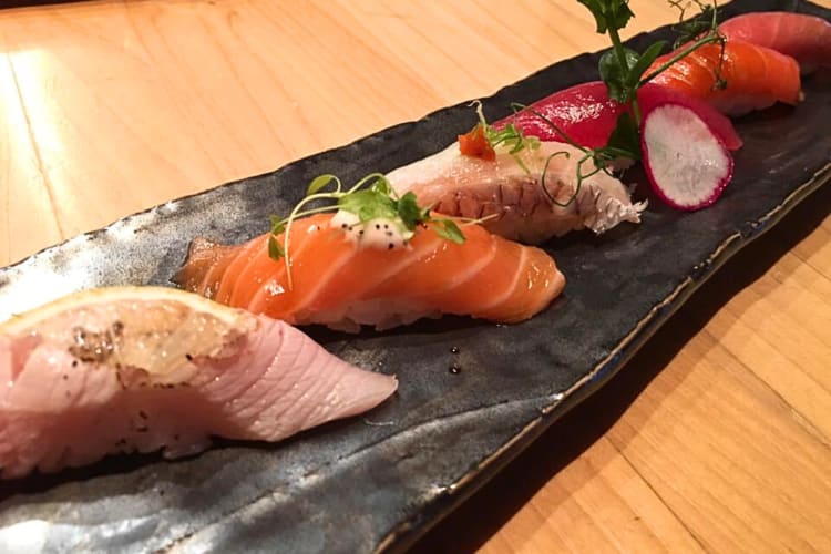 Six pieces of nigiri and sushi from MF Sushi