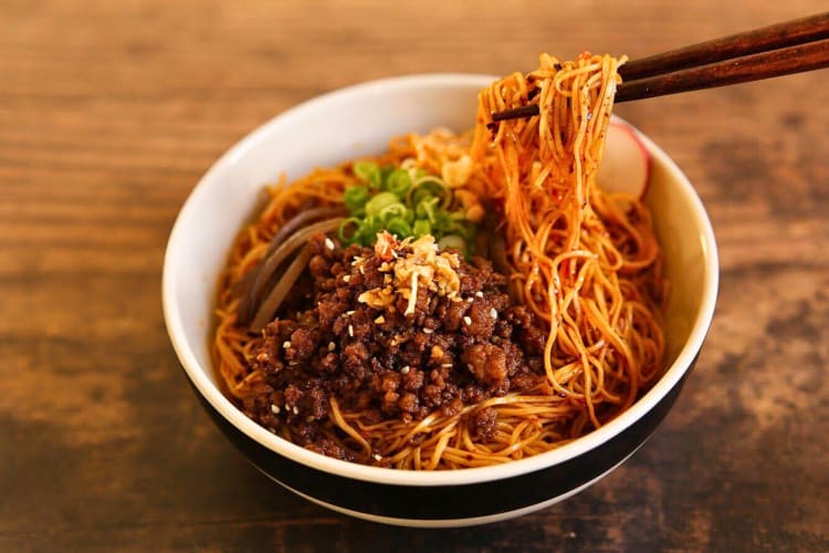 Noodle dish with mince on top from MOMO Noodle