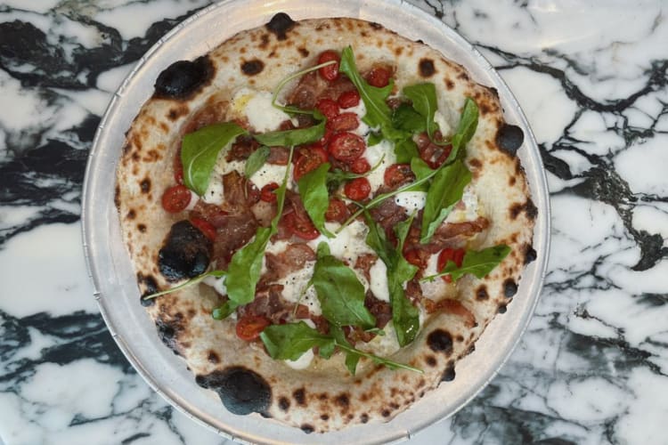 Delicious stone baked pizza at Marlow Maui 