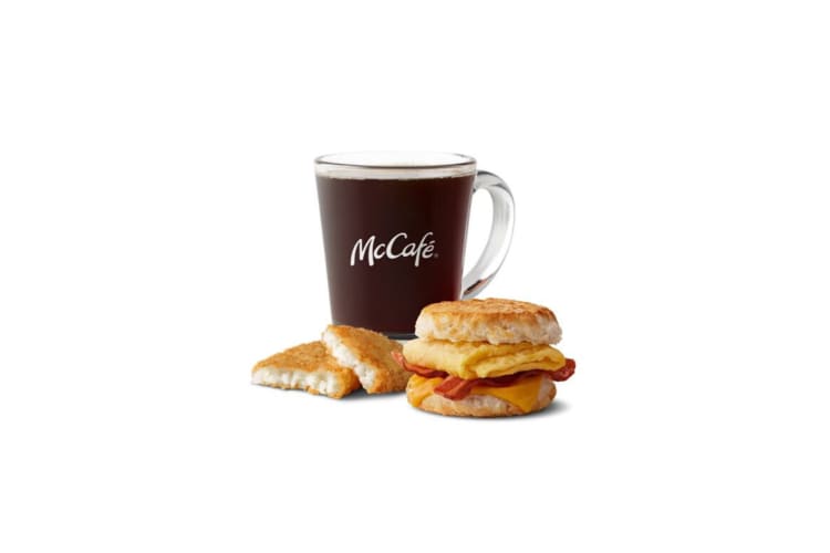 Bacon, egg and cheese biscuit meal from the Mcdonald's breakfast menu.