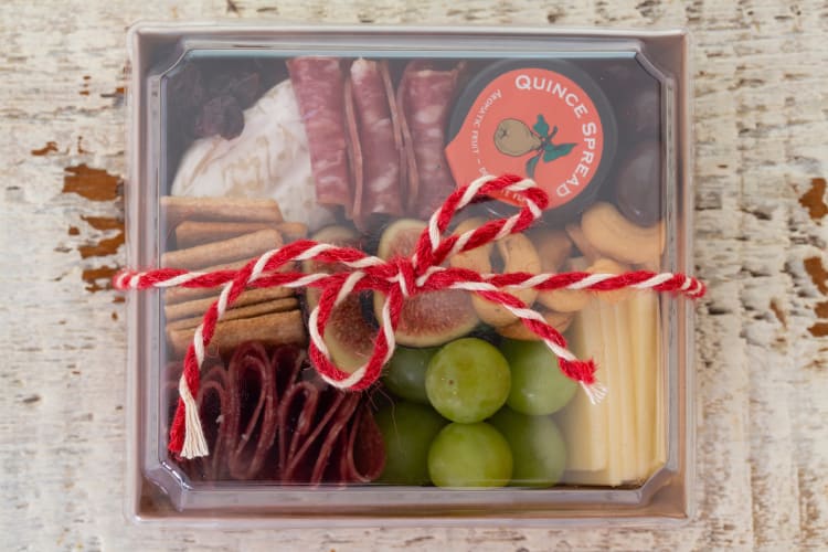 mini charcuterie boxes are a great holiday recipe idea that allows guests to mix and mingle