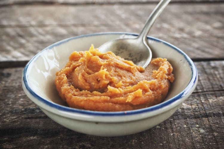 A bowl of miso paste with a spoon