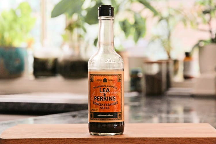 A bottle of Lea and Perrins Worcestershire sauce with an orange label