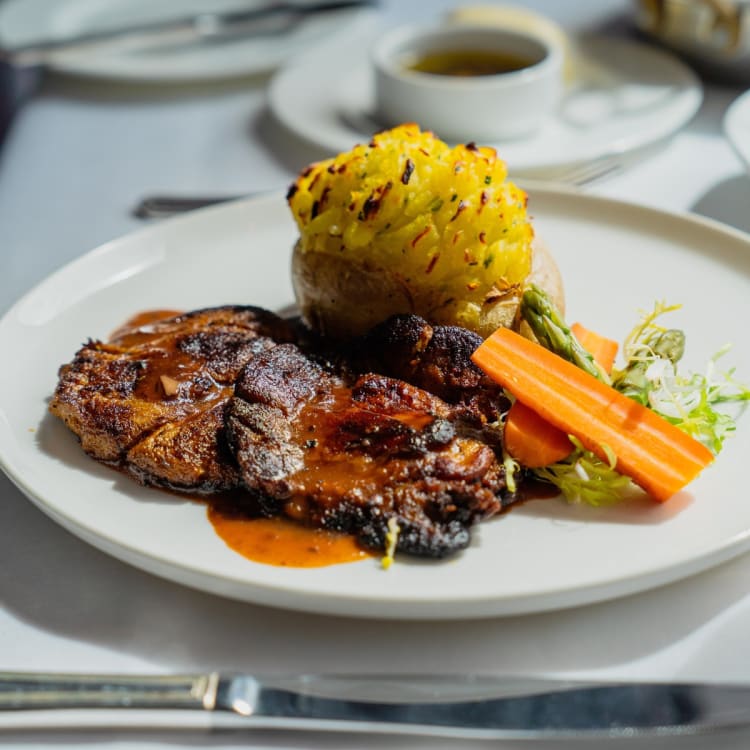 Duck breast meal with vegetable sides from Mister A’s