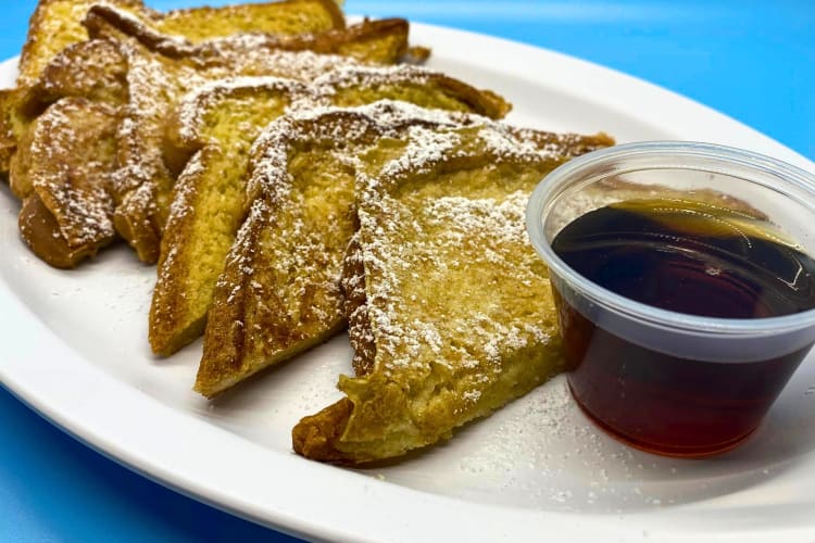 Five slices of French toast with syrup on the side from MoKaBe's Coffeehouse in St. Louis