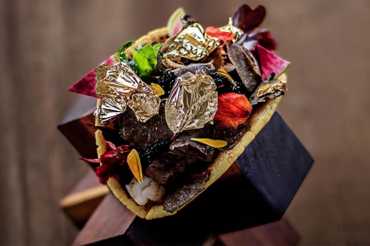 A taco with edible gold