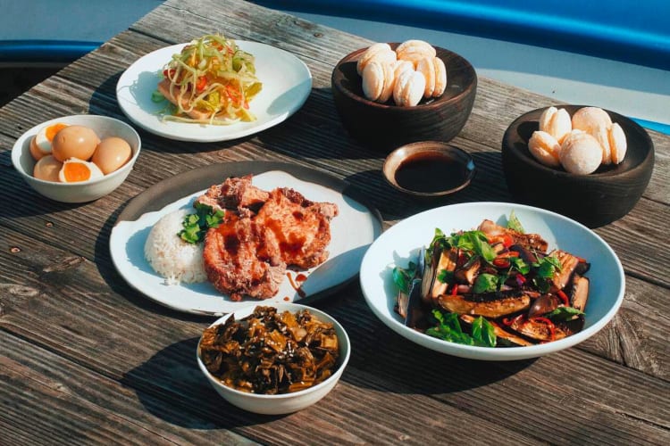 A selection of dishes on a wood table