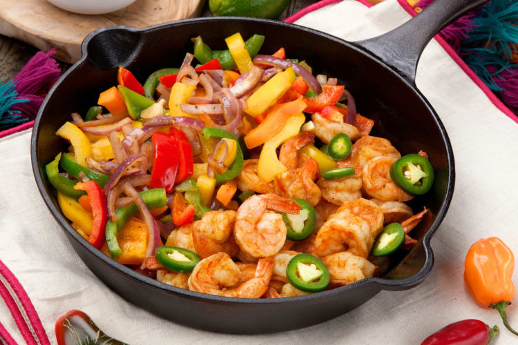 Making shrimp fajitas is a fun Mother's Day dinner idea